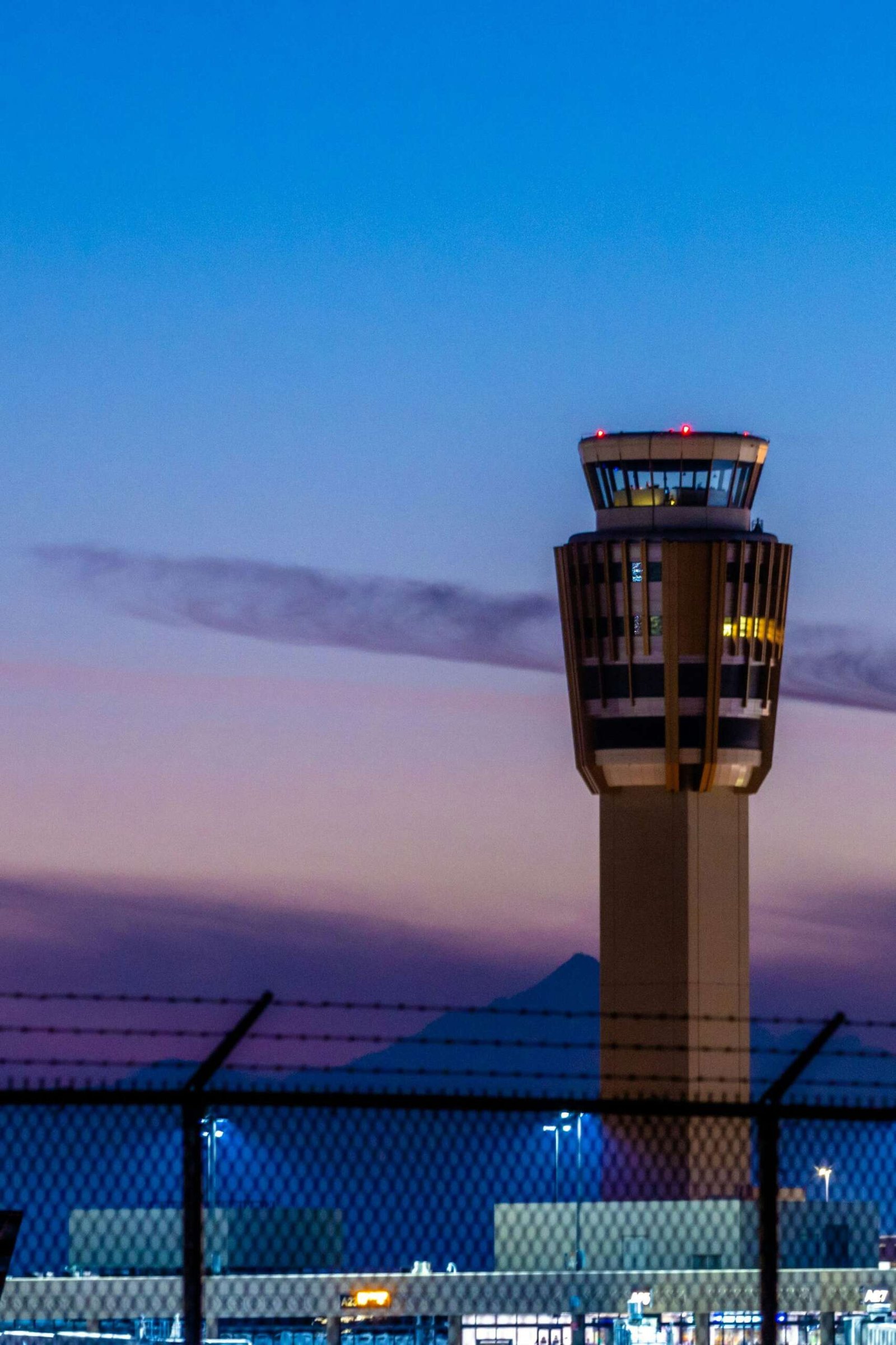 Air traffic control tower at dusk