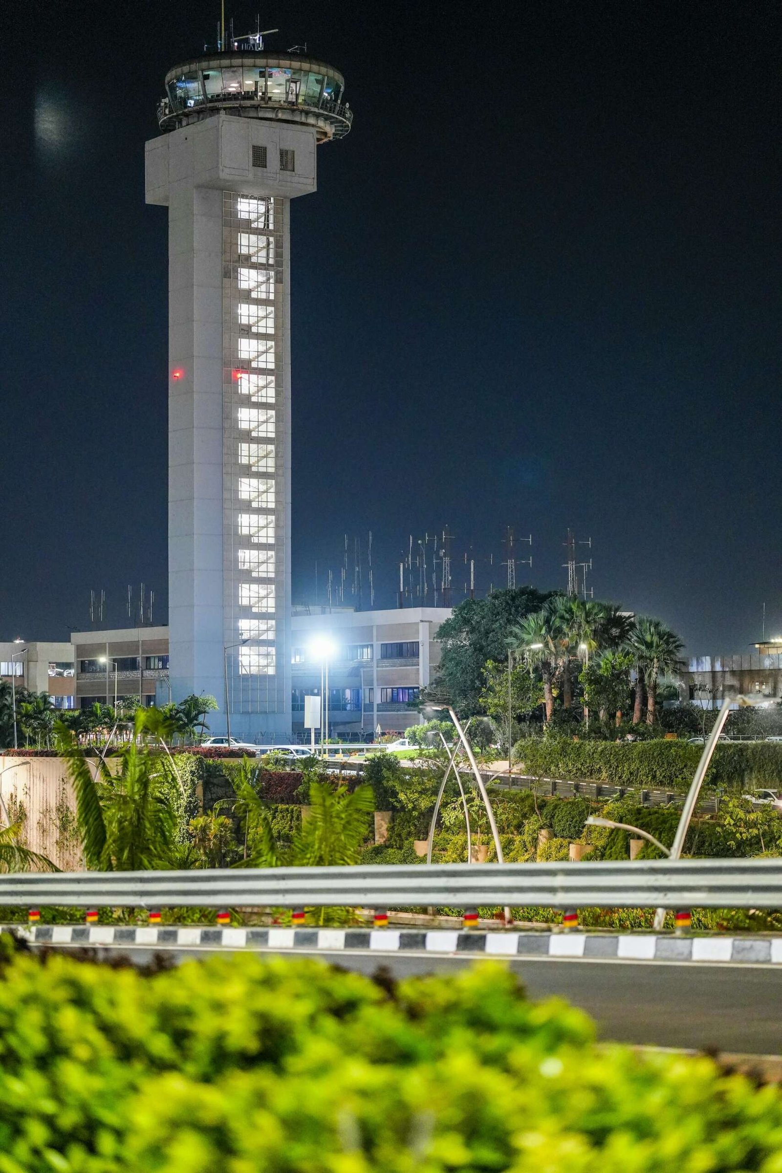 Air traffic control tower at night